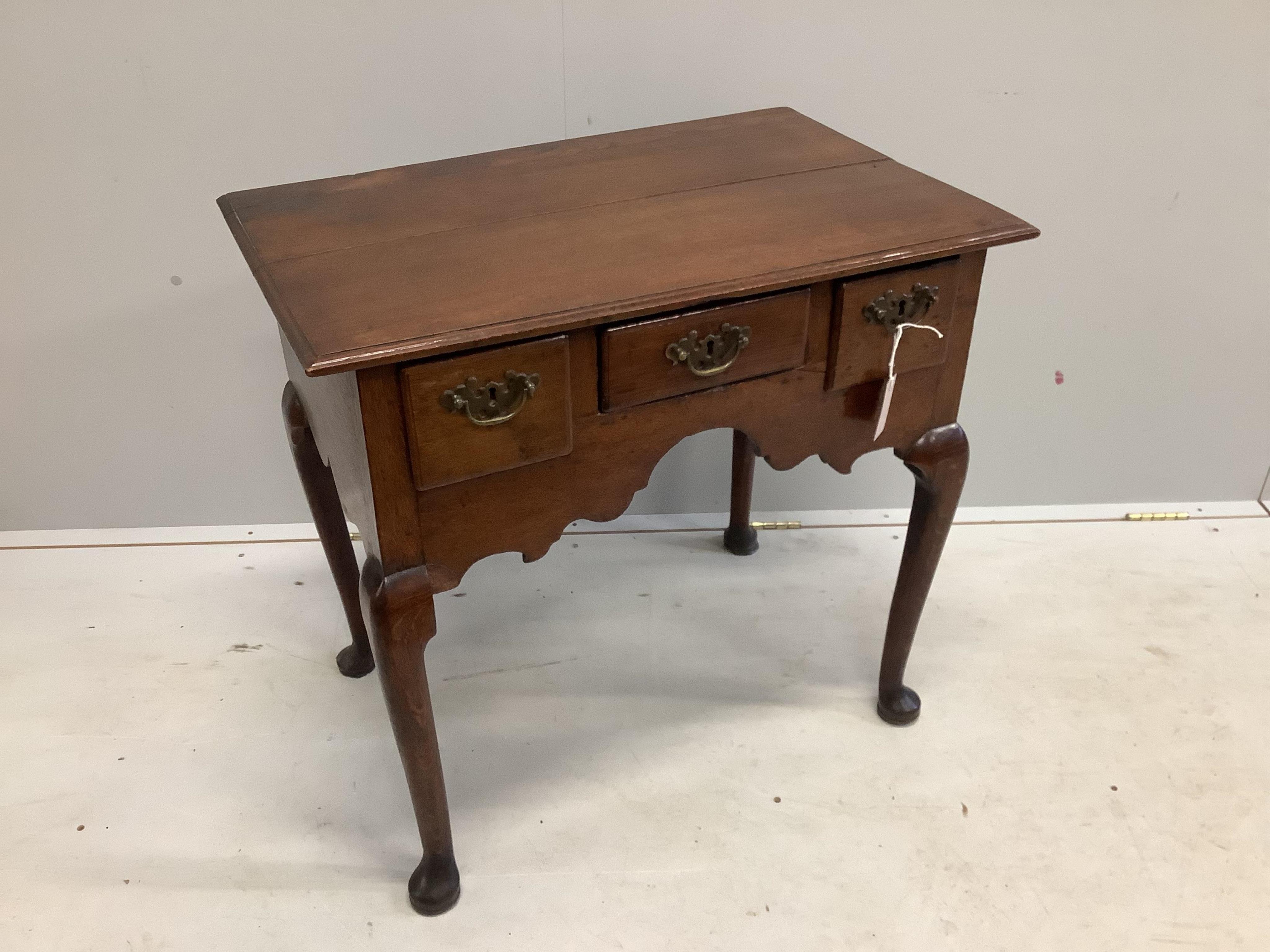 A George III and later oak lowboy, width 76cm, depth 48cm, height 72cm. Condition - fair